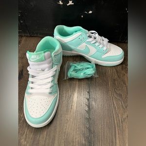 Nike green and white dunks. Never worn came too small size 6.5.